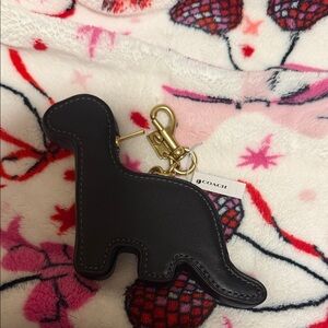 Coach Black Dino Keychain with Gold Accents